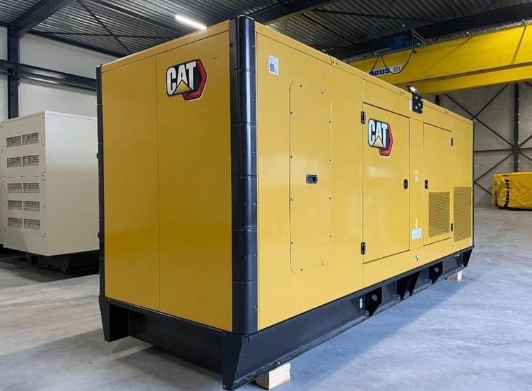 New CAT silenced generator set on skids in a warehouse